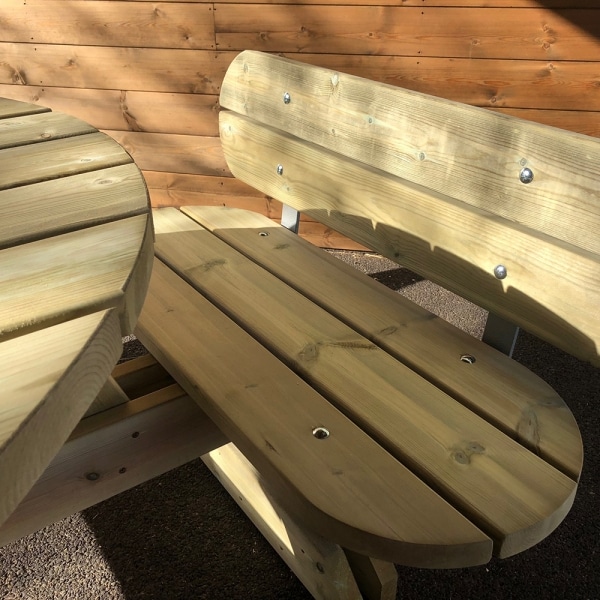 Smooth planed timber picnic table with seat backs and rounded edges