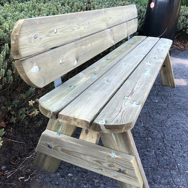 Traditional park style timber bench with rounded edges recreation area