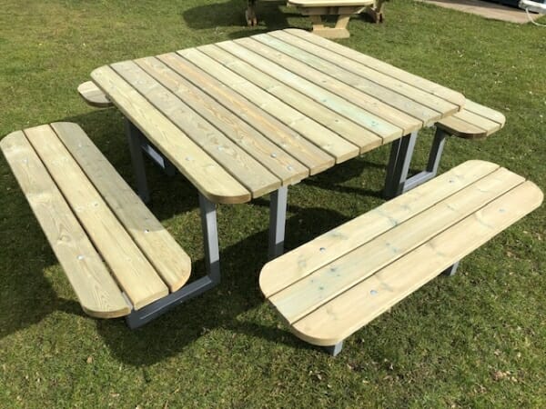 12 seater square wooden picnic bench with steel frame and rounded edges